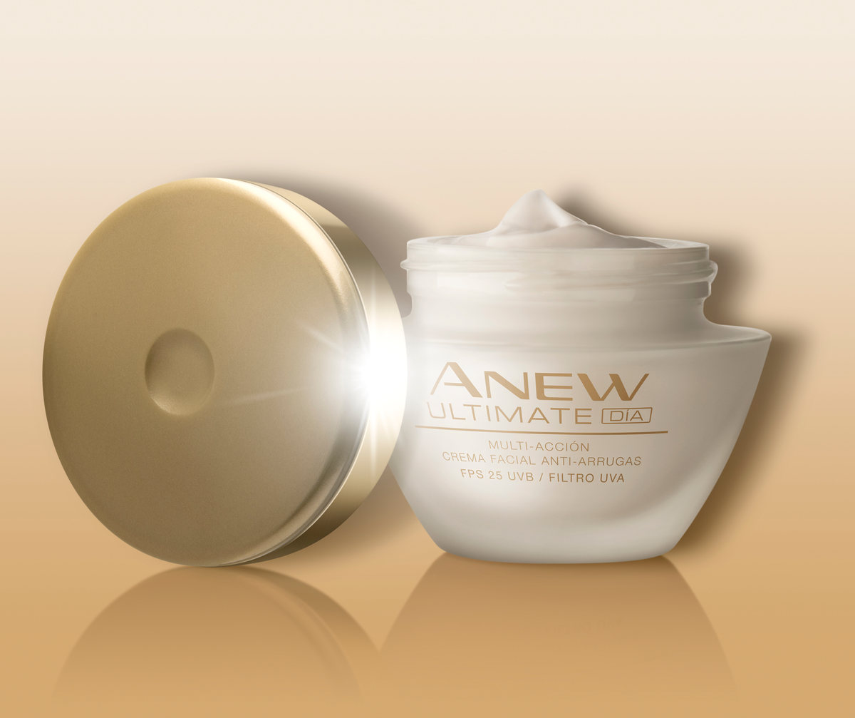 Open jar of Anew Ultimate cream with its gold lid on a gold background