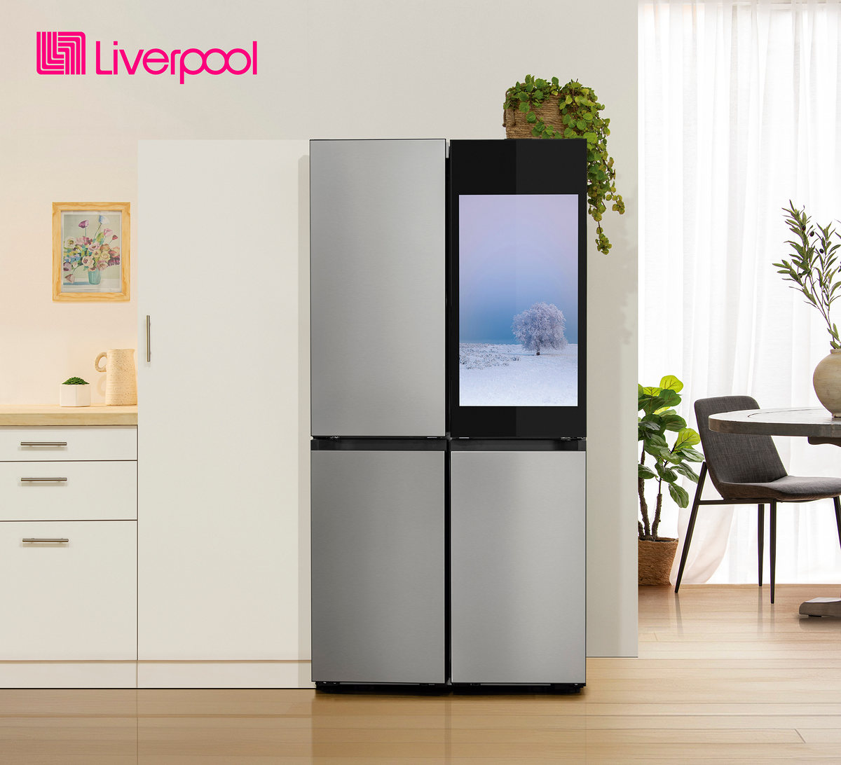 Four-door steel refrigerator in a bright kitchen, with the Liverpool logo